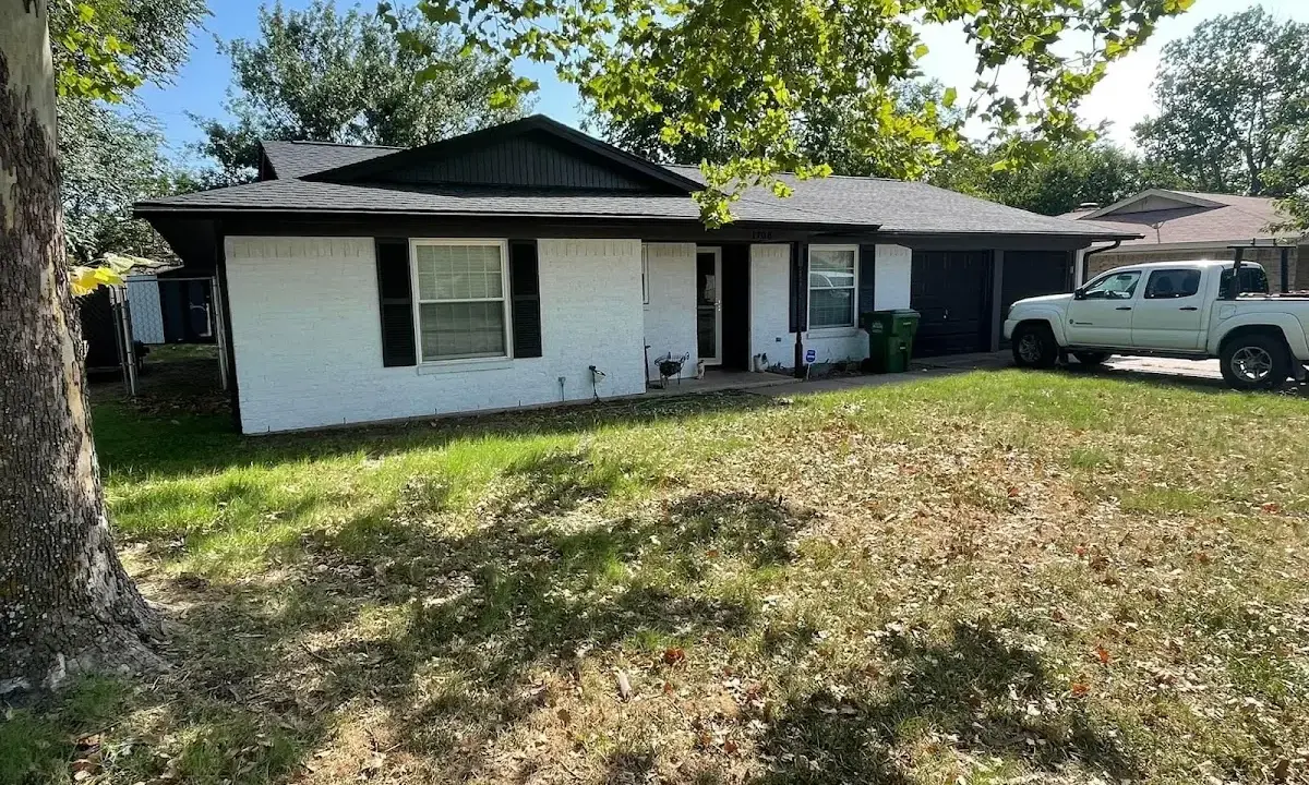 Professional roofing crew working on a residential roof in Port LaBelle